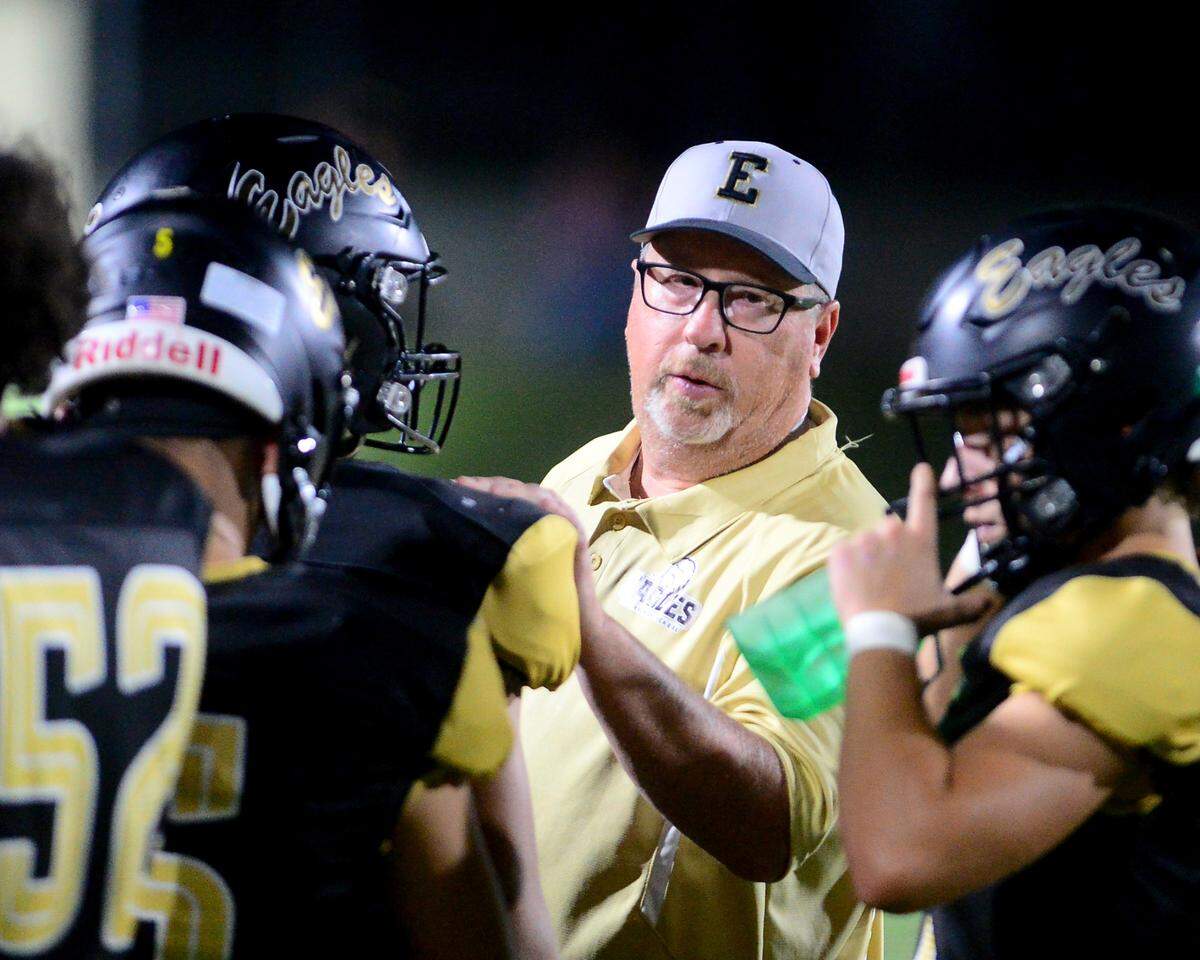 Enochs Head Coach Tracey Traub talks to his players during a game between Modesto High School and Enochs High School at Gregori High School in Modesto, Calif. on Friday, Oct. 4, 2024.