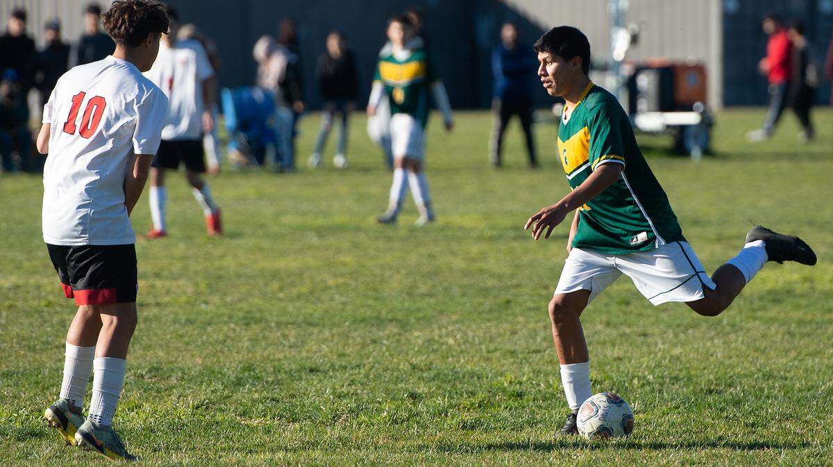 Davis’ Aarush Singh passes the ball during the game with Ceres at Davis High School in Modesto, Calif., Monday, Feb. 6, 2023. Davis won the game 6-0.