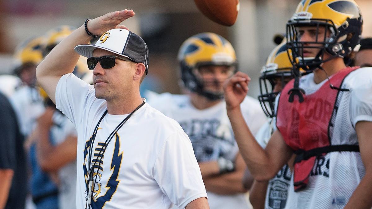 Gregori coach Jason McCoy signals for the sideline during a preseason scrimmage at Downey High School in Modesto, Calif., Friday, August 10, 2018. 