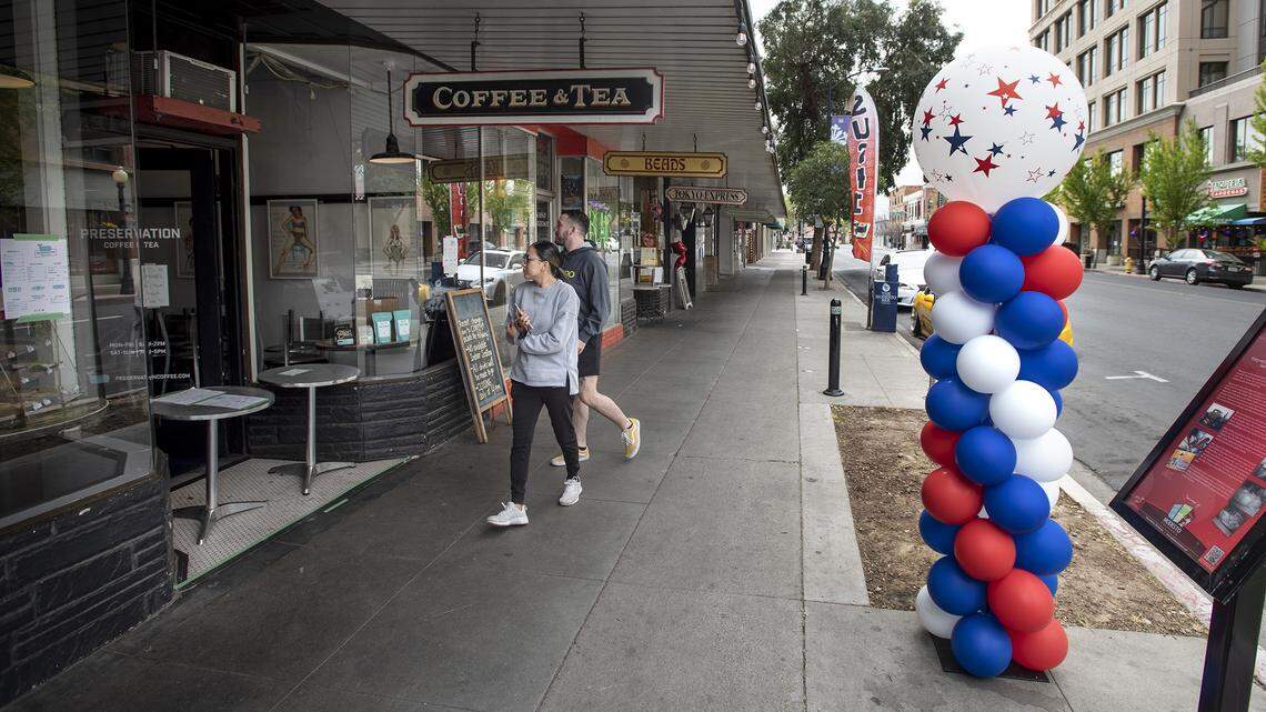 Opportunity Stanislaus has put out balloons in front of open businesses in the county. So far more than 100 businesses have been festooned with the big red-white-and-blue balloon pillars In Modesto. Photographed in Modesto, Calif., on Saturday, April 4, 2020.