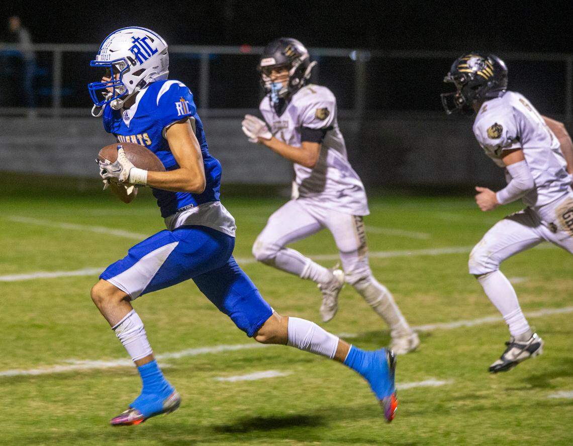 Luke Crivello, 3, of Ripon Christian works his way to the end zone for a touchdown against Golden Sierra Friday Nov. 03, 2023 at Ripon Christian.
