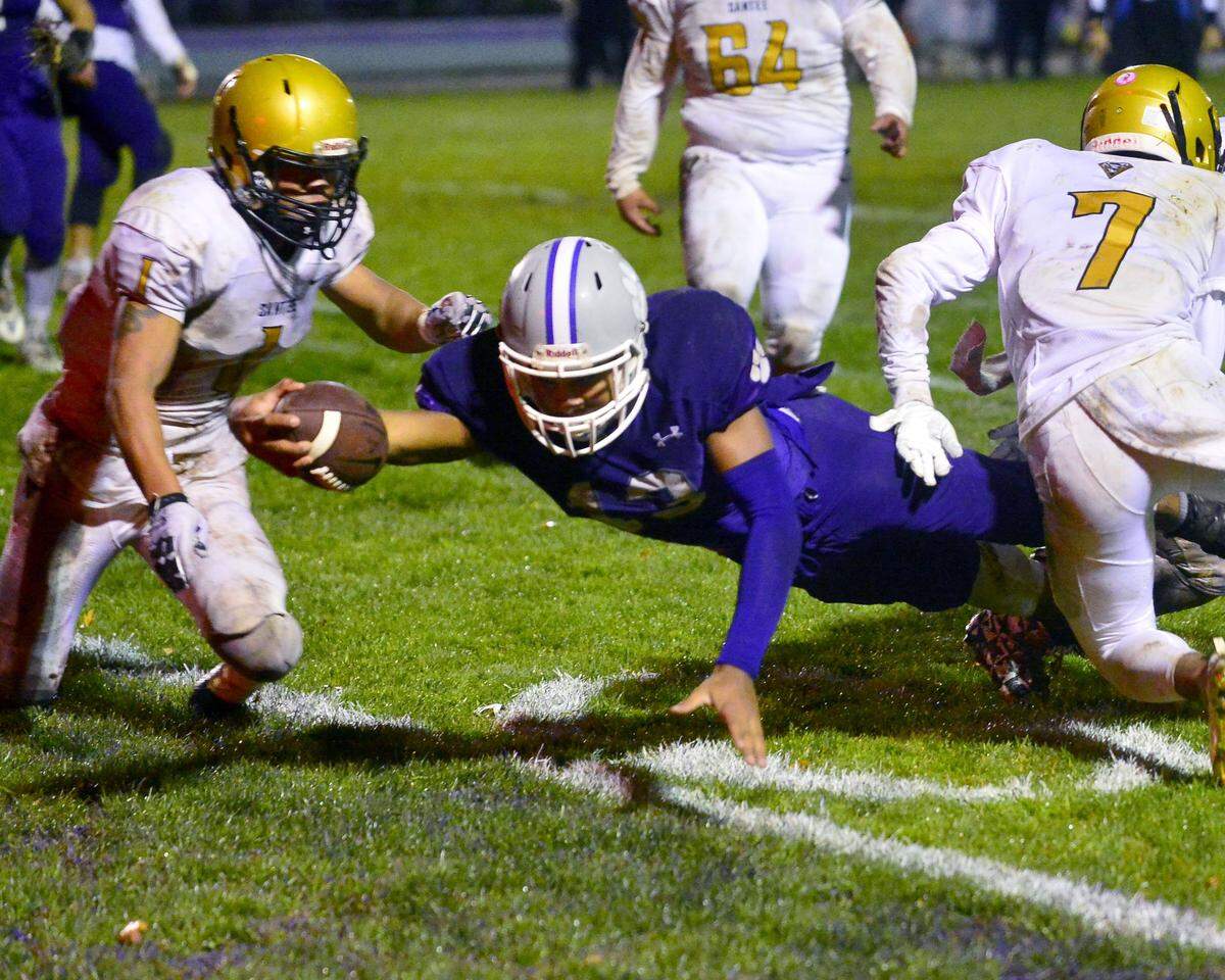 Denair running back Steffin Winston dives into the end zone for a touchdown during the CIF Division 7-AA championship game between Denair and Santee at Denair High School in Denair California on December 1, 2018.
