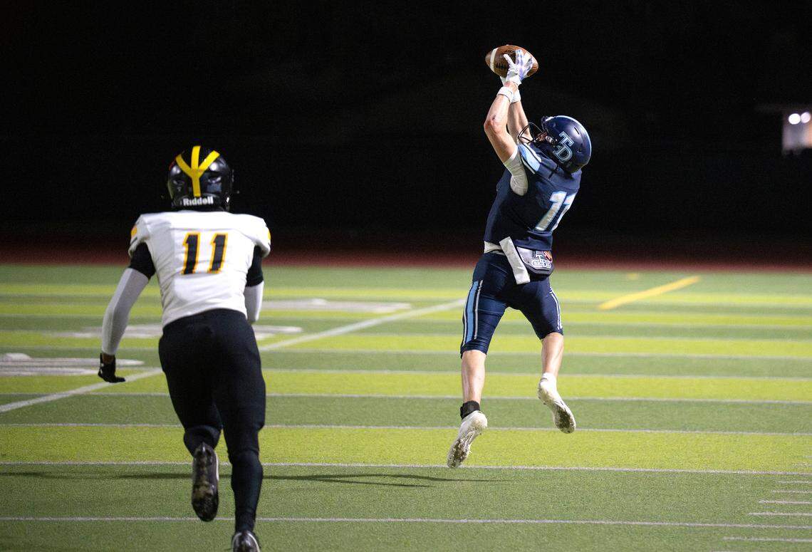 Downey’s Owen Sacuskie makes a 66-yard touchdown catch during the game with Del Oro at Downey High School in Modesto on Friday, Aug. 22, 2025.  