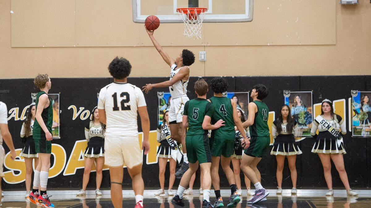 Enochs’ Kevin King scores on a reverse layup during the Central California Athletic League game with Pitman at Enochs High School in Modesto, Calif., Friday, Feb. 10, 2023.