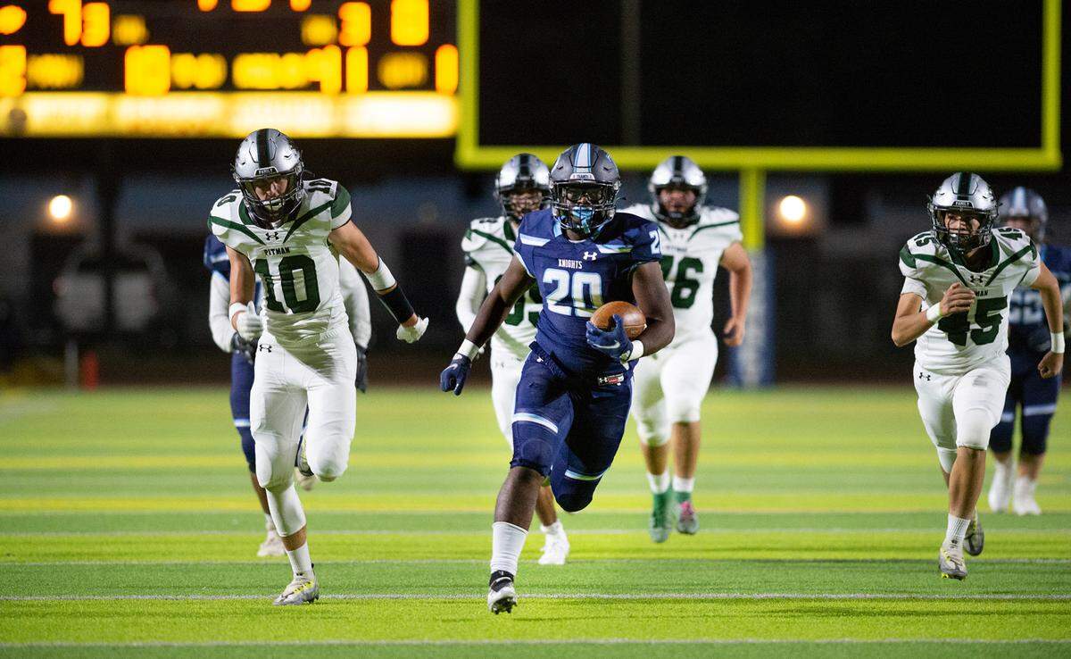 Downey’s Ki Ragland breaks free for a touchdown run during the Central California Athletic League game with Pitman at Downey High School in Modesto, Calif., Friday, Oct. 28, 2022. Downey won the game 70-13.