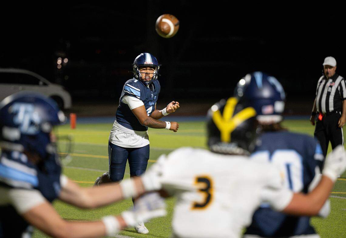 Downey quarterback Julian Masaniai makes a pass during the season-opening game with Del Oro at Downey High School in Modesto on Friday, Aug. 22, 2025.  