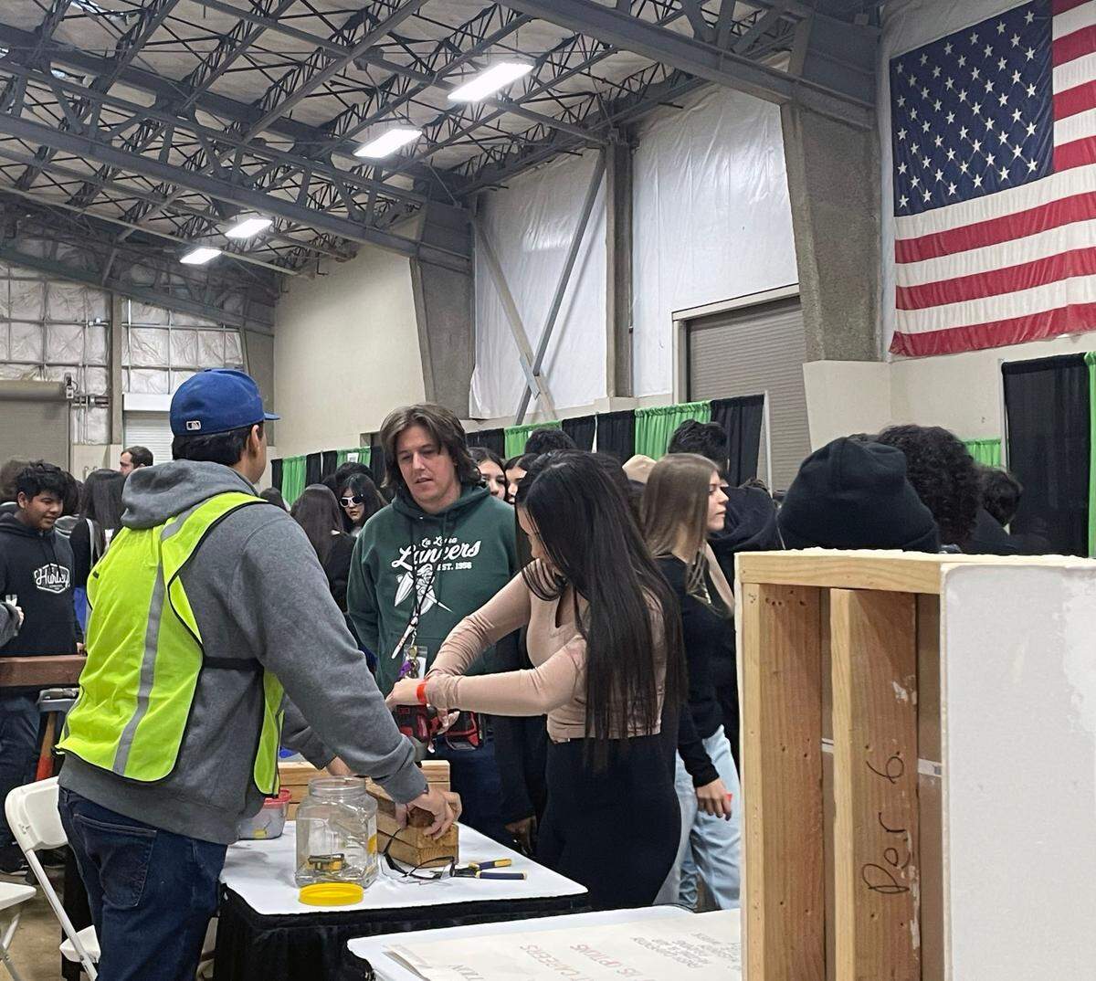 Modesto City Schools students using construction tools at the ”Inspire Youth Inspire Dreams” expo on Nov. 30, 2023.