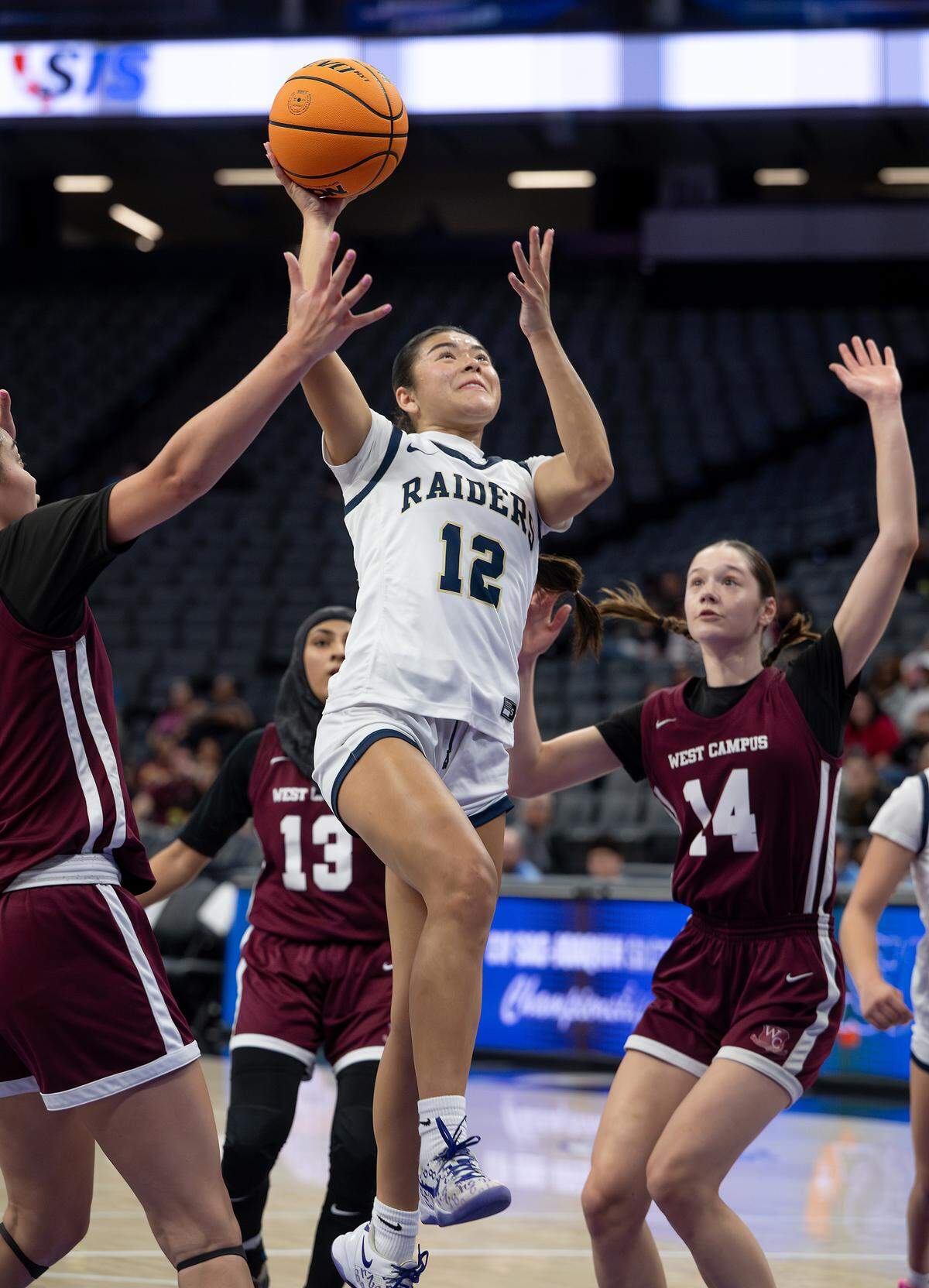 Central Catholic Hannah Garcia drives to the hoop during the Sac-Joaquin Section Division IV championship game with West Campus at the Golden 1 Center in Sacramento, Friday, Feb. 27, 2026.