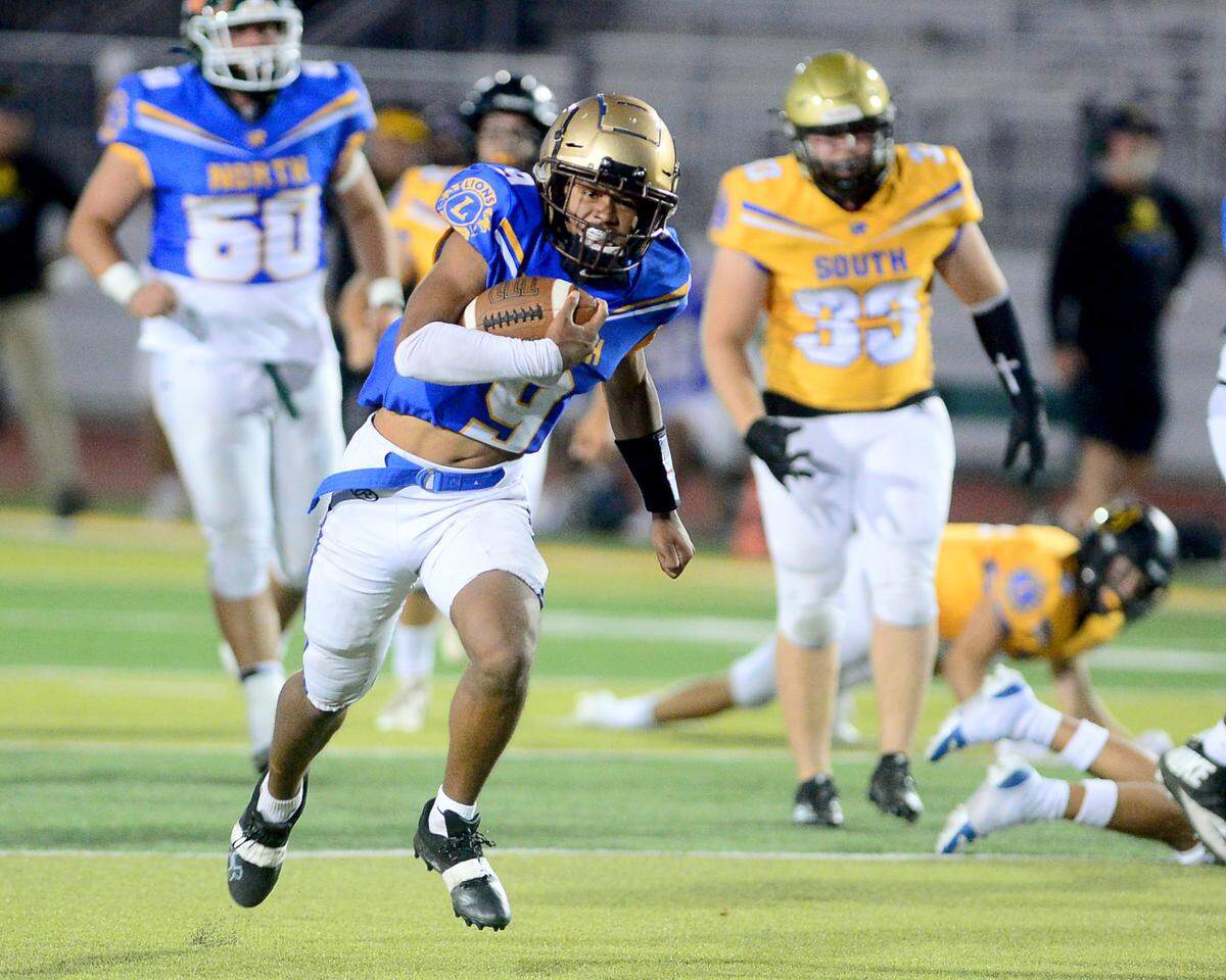 St. Mary’s quarterback Samson Hunkin (9) scrambles upfield during the 2024 Lions All-Star High School Football game at Tracy High School in Tracy, Calif. on June 22, 2024.