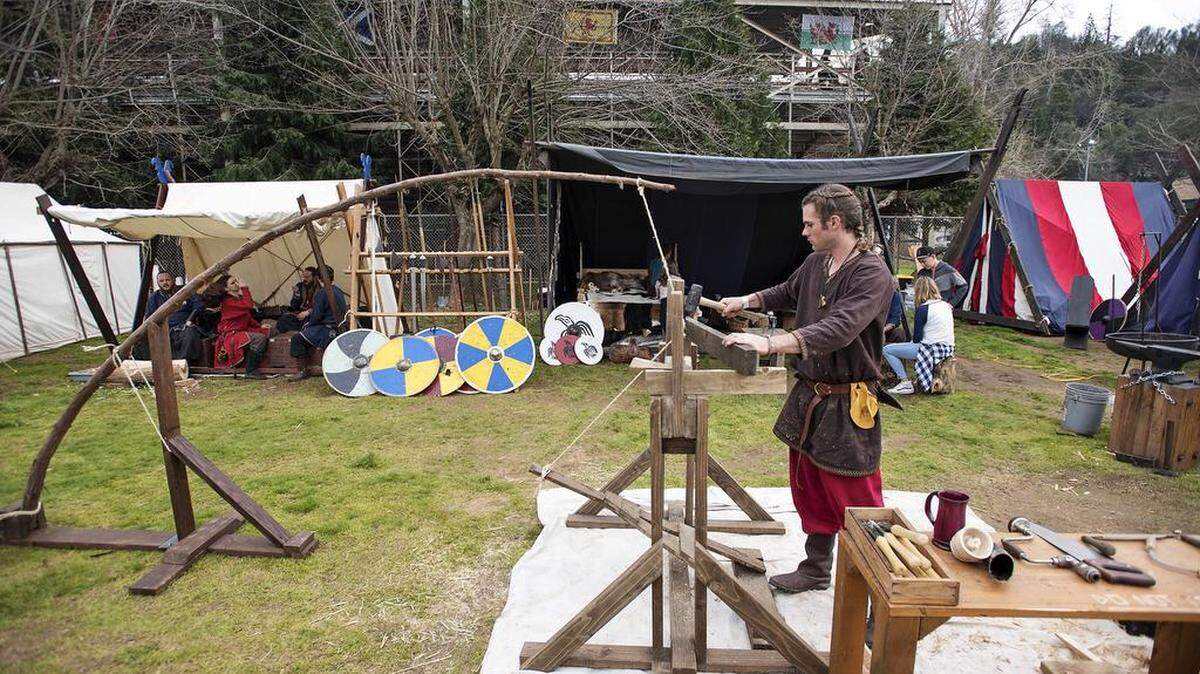 Uriah Ballou works a Viking spring pole lathe during the Sonora Celtic Faire at Mother Lode Fairgrounds in 2017.
