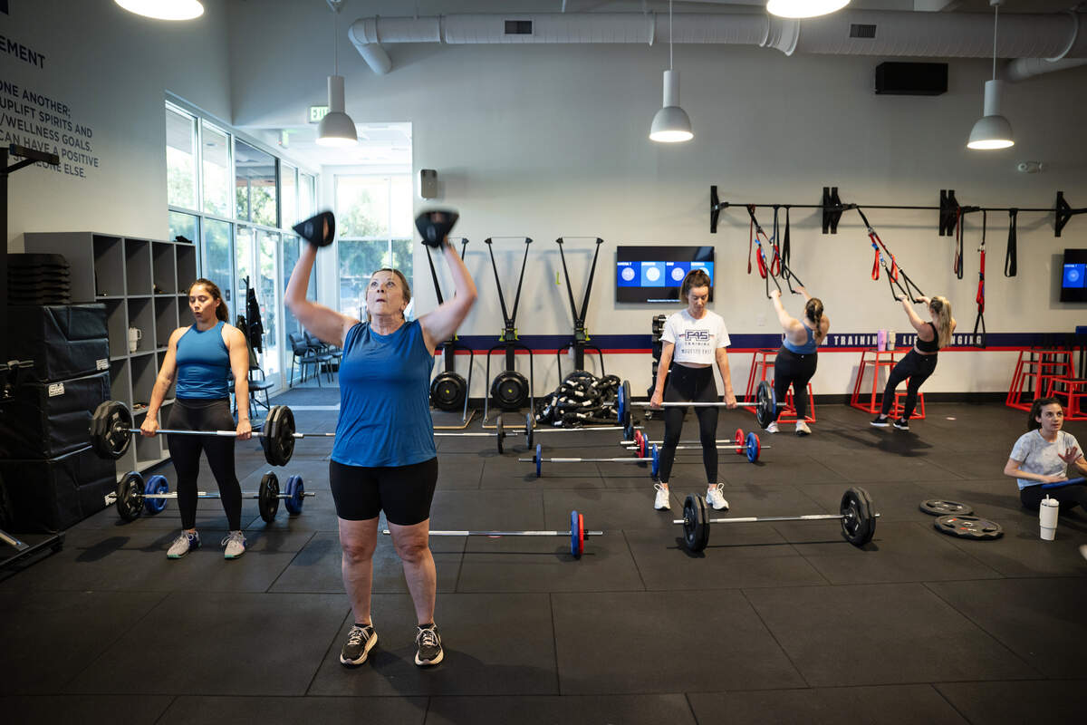 Jennifer Gowans, middle left, and classmates work out during a strength training class at F45 Training in Modesto on Tuesday, June 3, 2025.