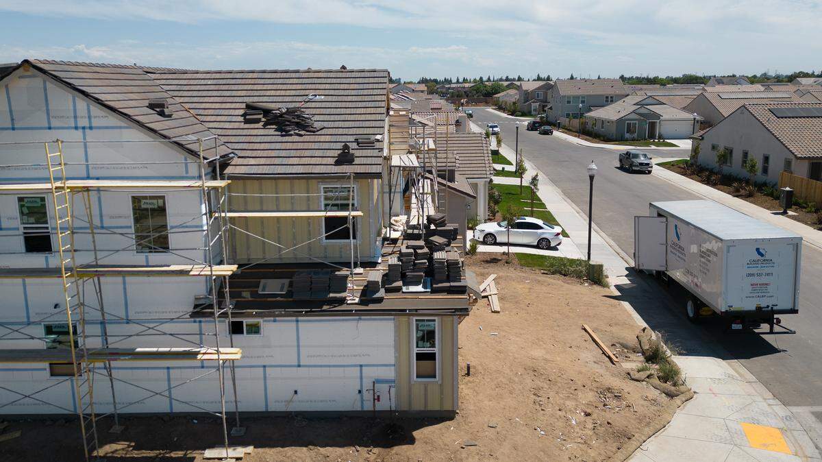 Homes under construction in the Crossroads West housing development in Riverbank, Calif., are pictured Wednesday, August 16, 2023.