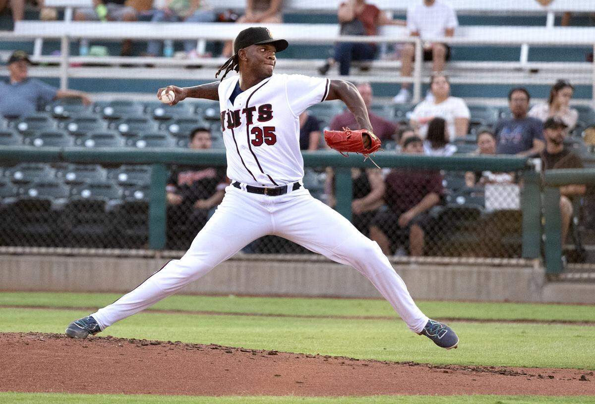 Modesto Nuts’ Anyelo Ovando delivers a pitch during the game with the Stockton Ports at John Thurman Field in Modesto, Calif., Friday, July 19, 2024.