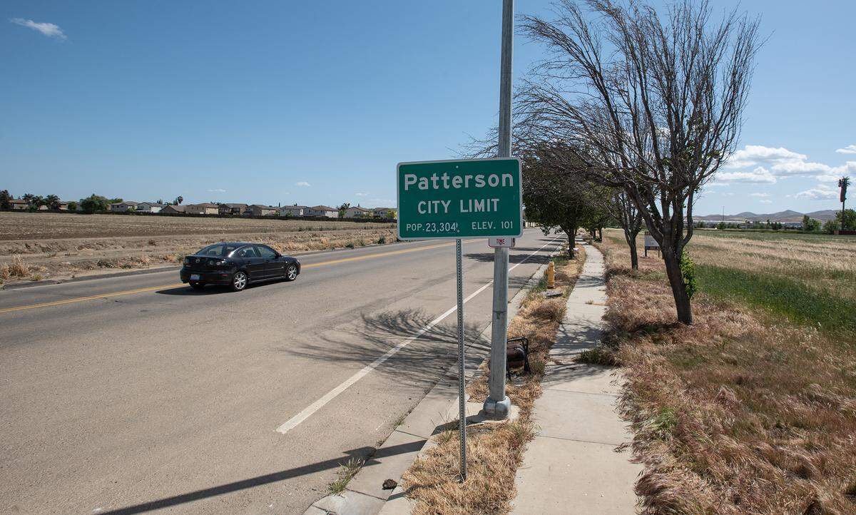 Site of the proposed Zacharias housing development, left, along Baldwin Road in Patterson, Calif., on Tuesday, April 12, 2022.