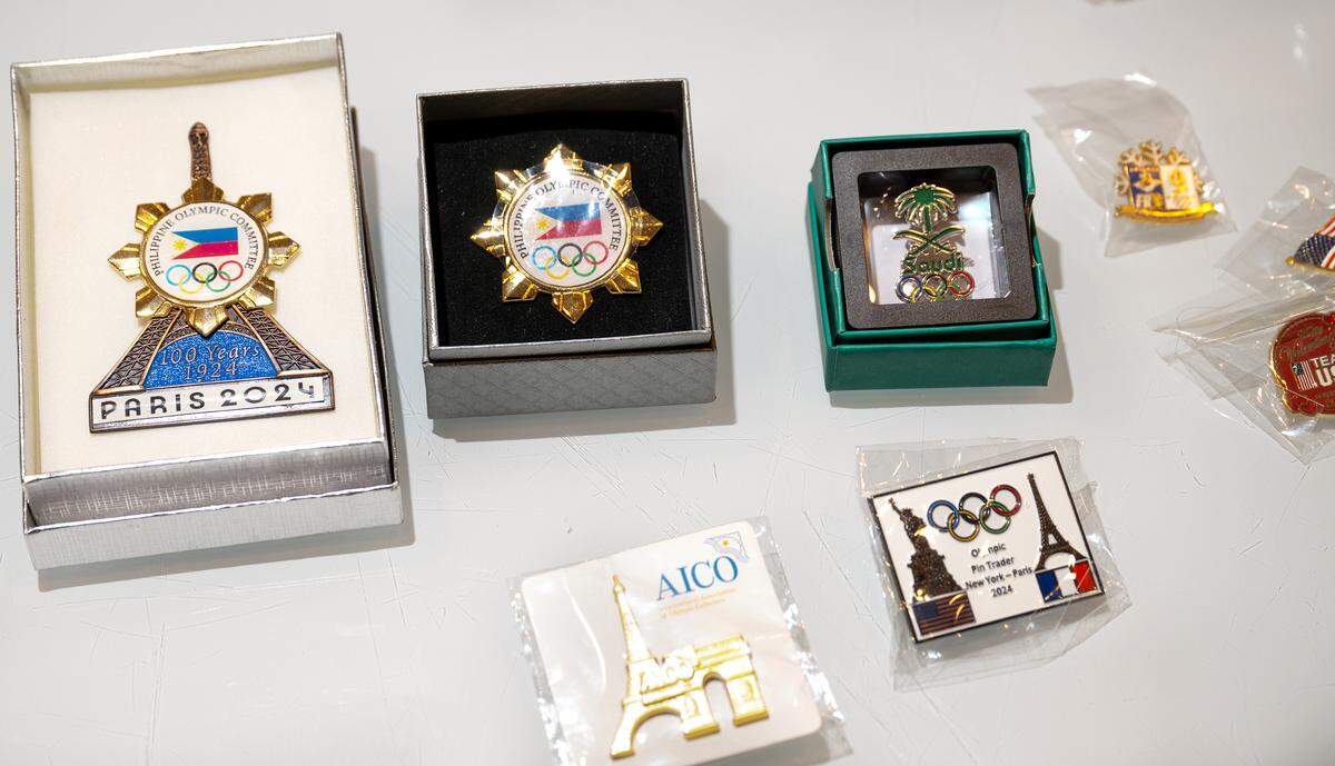 Modesto resident Jeff Kolkmann has exchanged Olympic pins with other visitors at the Games over the years. 