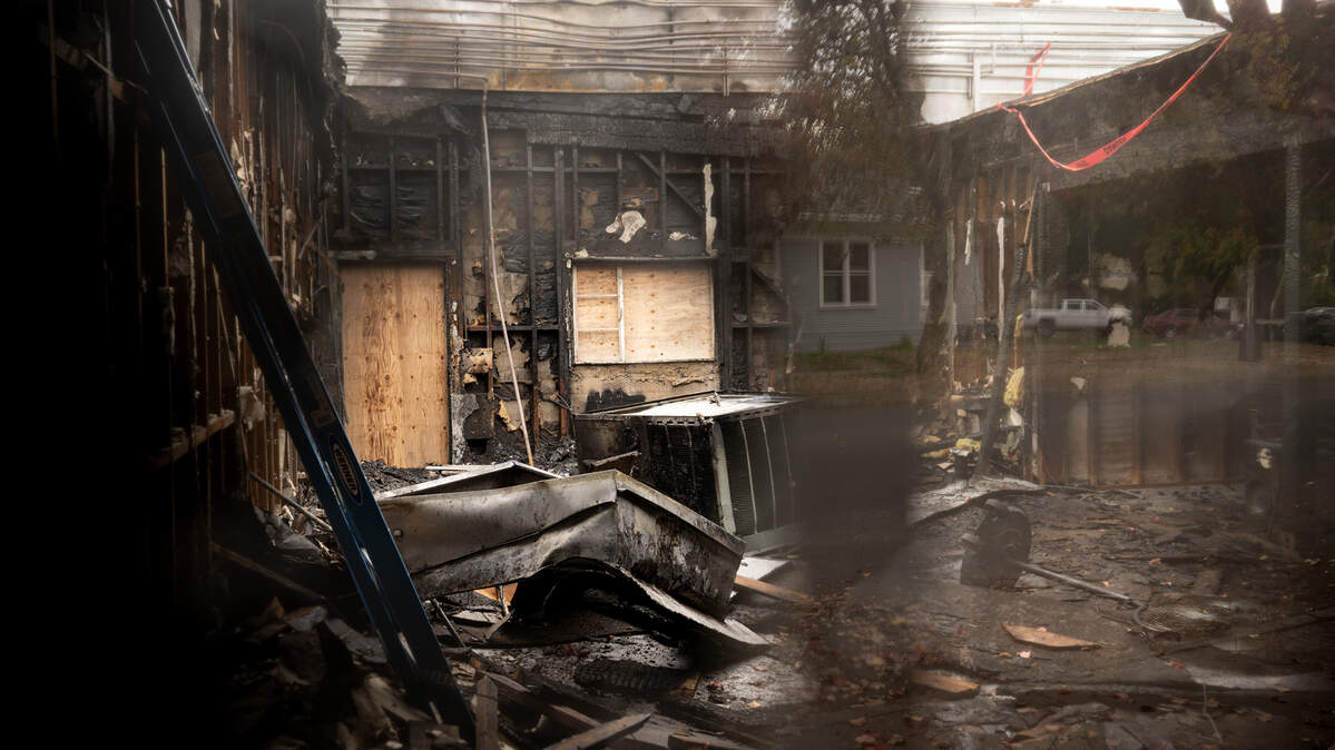 The damage from a early morning fire can be seen through a broken window, Gottschalk Music Center and Annex Hair Studios were damaged by the fire that started in the unit between the two businesses. Photographed in Modesto, Wednesday, Nov. 20, 2024.