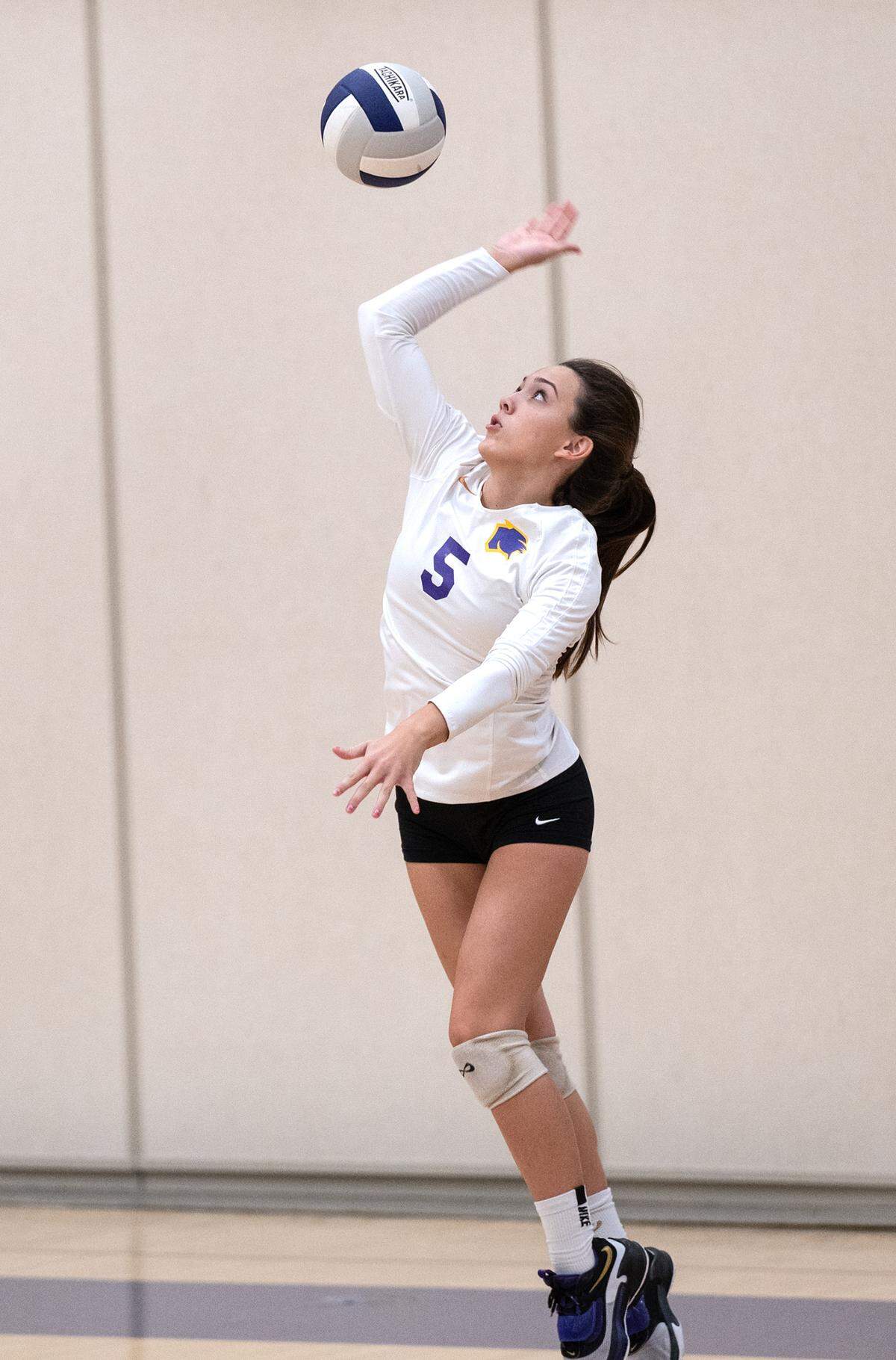 Escalon’s Emily Vickers serves the ball during the non-league match with Modesto Christian in Escalon, Calif., on Wednesday, September 7, 2022. Escalon won 3-0.