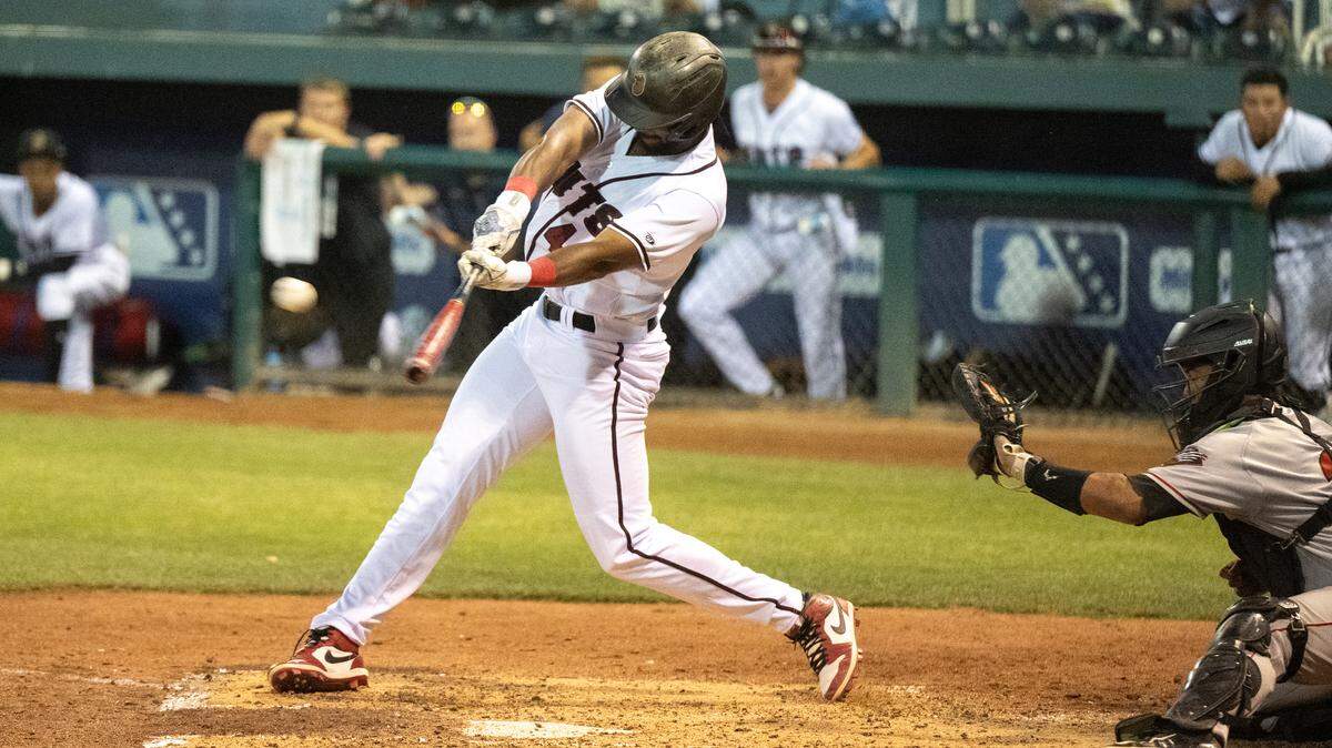Modesto Nuts’ Lazaro Montes (44) drives in a run with a double in the game with the Fresno Grizzlies at John Thurman Field In Modesto, Calif., Wednesday, June 5, 2024.