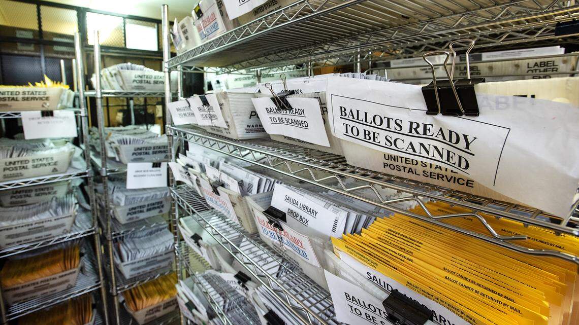Ballots cast Monday and Tuesday await scanning and counting at the Stanislaus County Registrar of Voters office in Modesto, Calif., on Wednesday, Nov. 4, 2020.