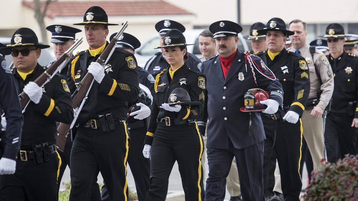 Members of law enforcement file into church before the Annual Blue Mass at St. Joseph’s Catholic Church in Modesto on Saturday, Jan. 14, 2017.