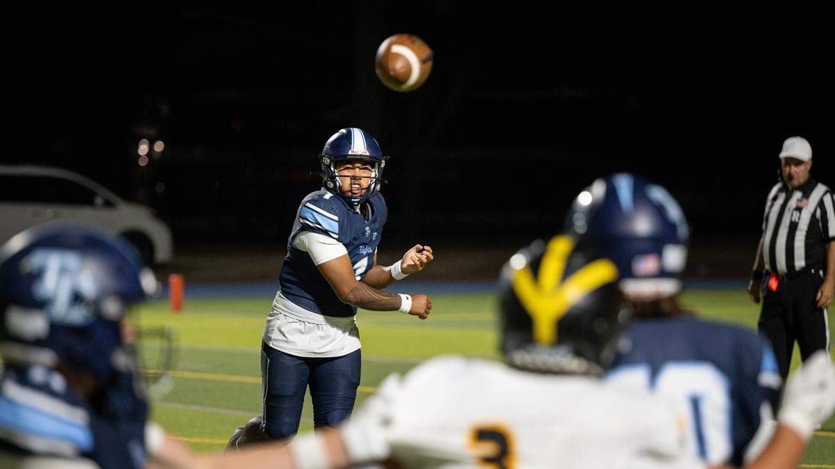 Downey quarterback Julian Masaniai makes a pass during the season opening game with Del Oro at Downey High School in Modesto, Friday, Aug. 22, 2025.