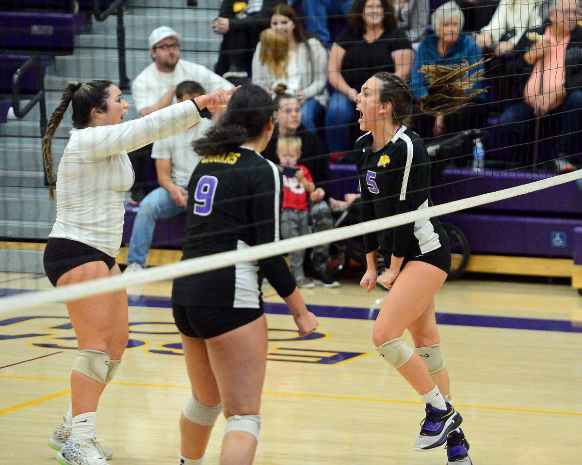 Escalon’s Emily Vickers (5) celebrates with teammates during a CIF San-Joaquin Division III Girls Volleyball Playoffs game between Escalon High School and Ponderosa High School at Escalon High School in Escalon CA on November 1, 2022. Escalon won the match 3-2.