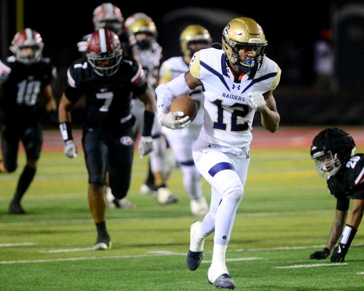 Central Catholic running back Joey Alcutt (12) breaks free during a game between Central Catholic High School and Patterson High School at Patterson High School in Patterson California on September 9, 2024. Central Catholic won the game 25-14