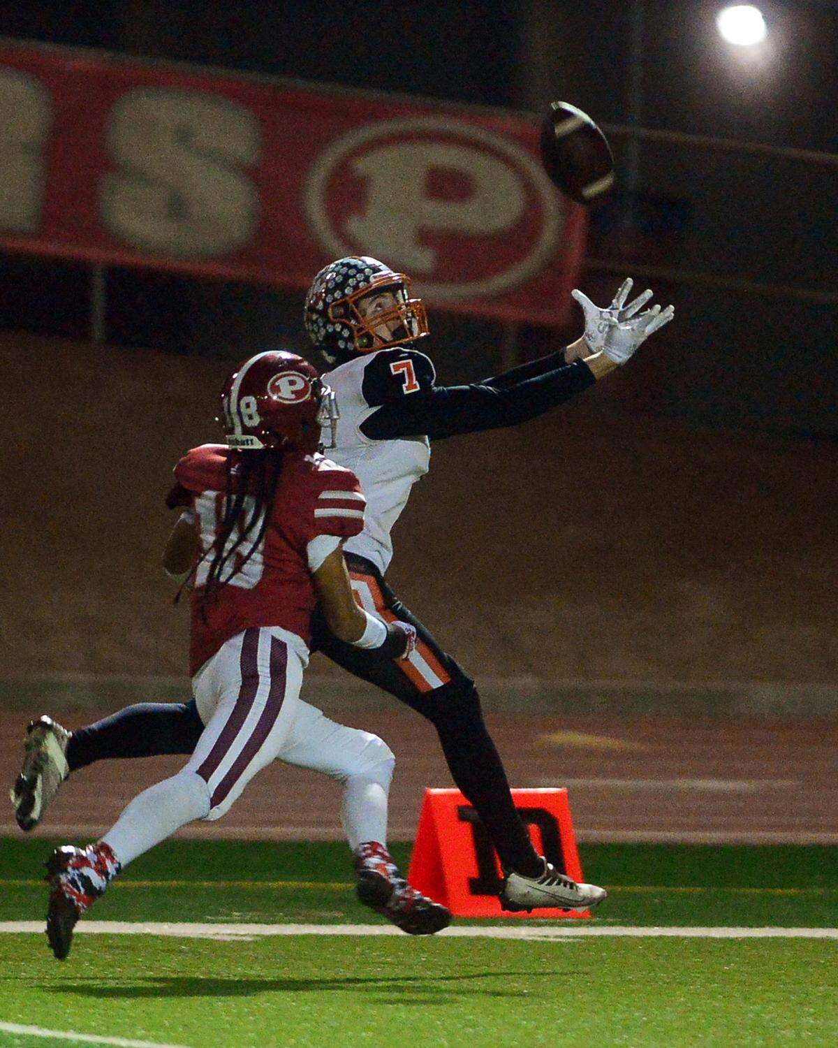 Roseville receiver Joel Bradley reaches to make a catch during a CIF Division III Sac-Joaquin Section football playoff game against Patterson at Patterson High School in Patterson, California, on Nov. 11, 2022. Patterson won 56-34.