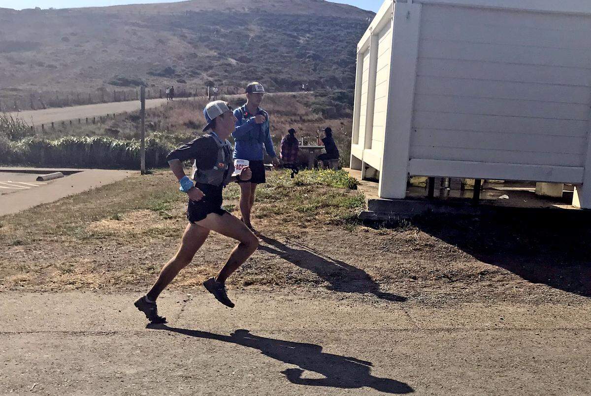 Waterford High senior Ethan Valdez runs toward the finish line at the Headlands Hundred Race at Rodeo Beach in Sausalito, California on Sunday, Sept. 15, 2019.