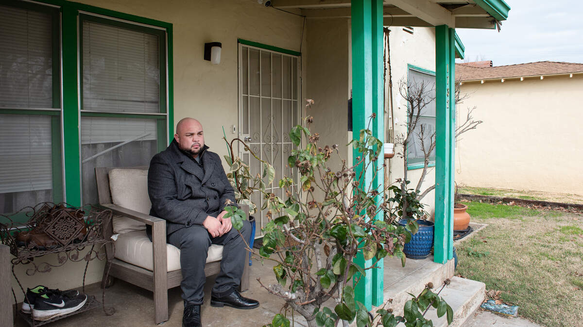 Reggie Refuerzo at his home in Escalon, Calif., on Wednesday, Feb. 3, 2021. Despite declaring his inability to pay rent after testing positive for COVID-19, Refuerzo is fighting an eviction he received from the property management company.