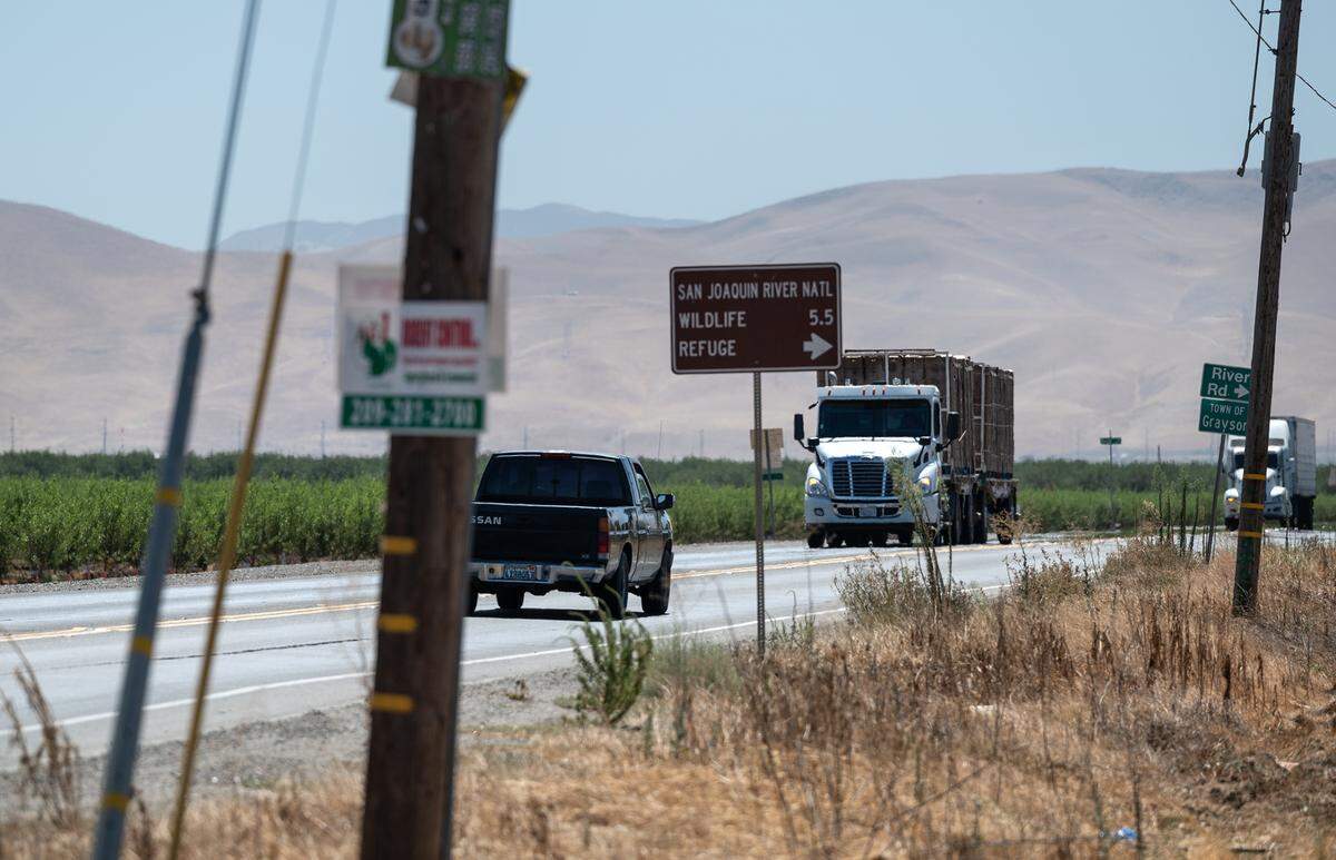 Motorists and trucks on Grayson Road in Grayson, Calif., on August 24, 2022.