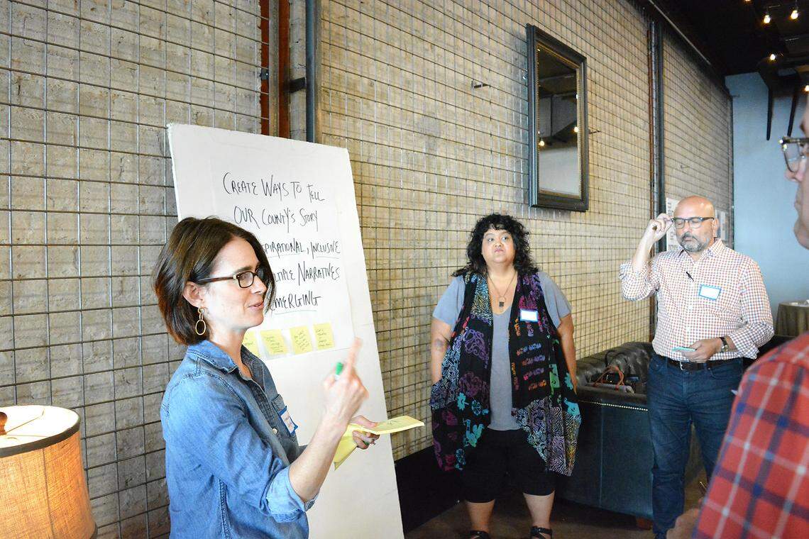 Amanda Hughes, Program Director for the Stanislaus Community Foundation, discusses ideas with group at Designing the Future of Stanislaus County on Sept. 27 at Greens on Tenth.