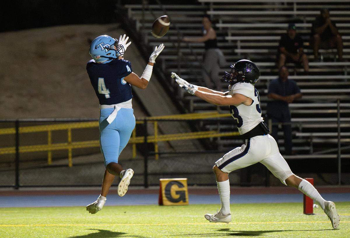 Downey’s Joseph Ramirez makes a touchdown catch during the non-league game with Amador Valley at Downey High School in Modesto, Calif., Friday, Sept. 13, 2024.