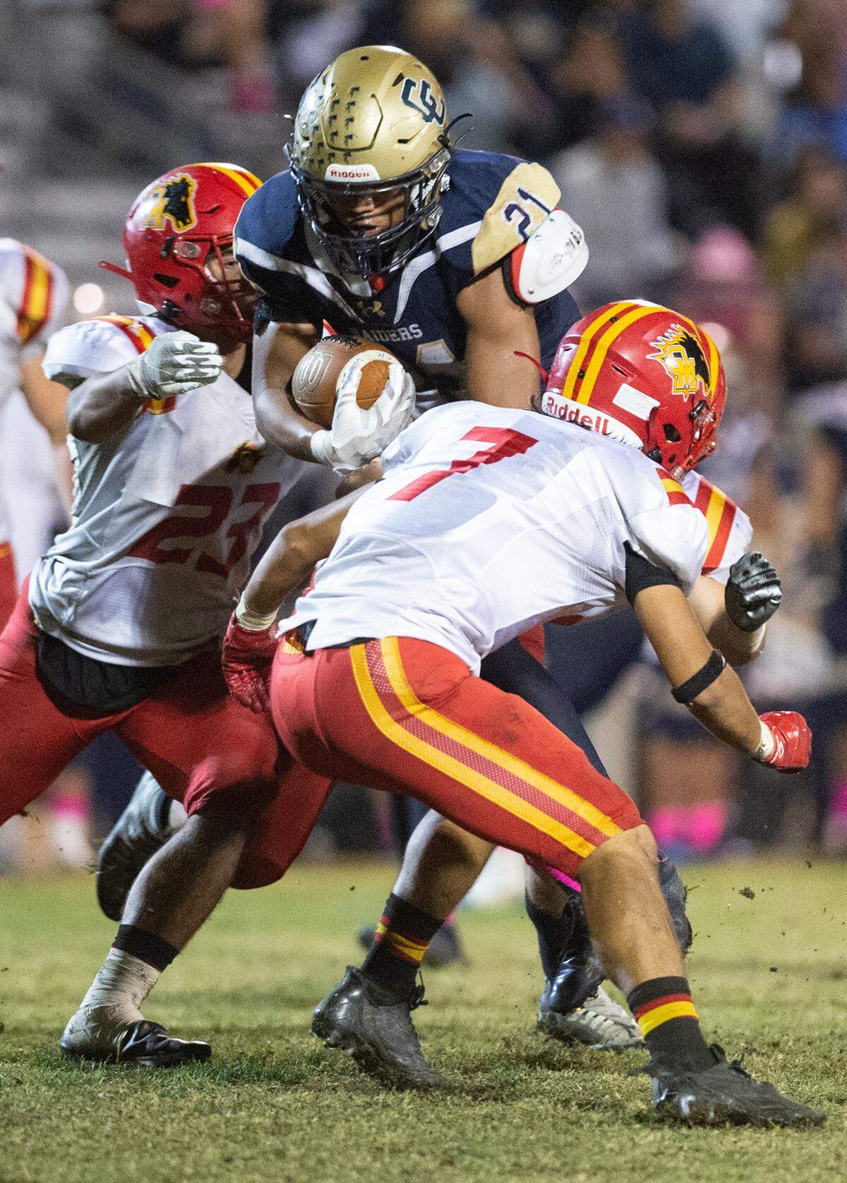 Central Catholic’s Joel Roberts powers his way for several yards during the Valley Oak League game with Oakdale in Modesto, Calif., Friday, Oct. 14, 2022.