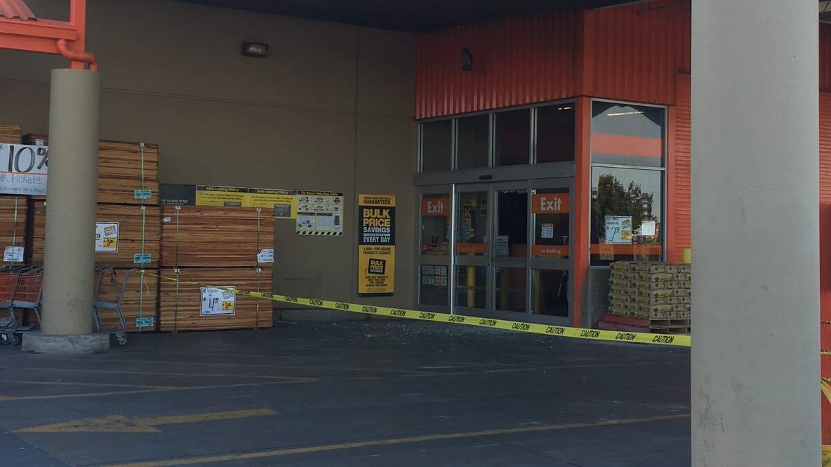 A burglar fired several rounds from a handgun when he and his accomplice encountered employees early Wednesday at the Home Depot store in Turlock.