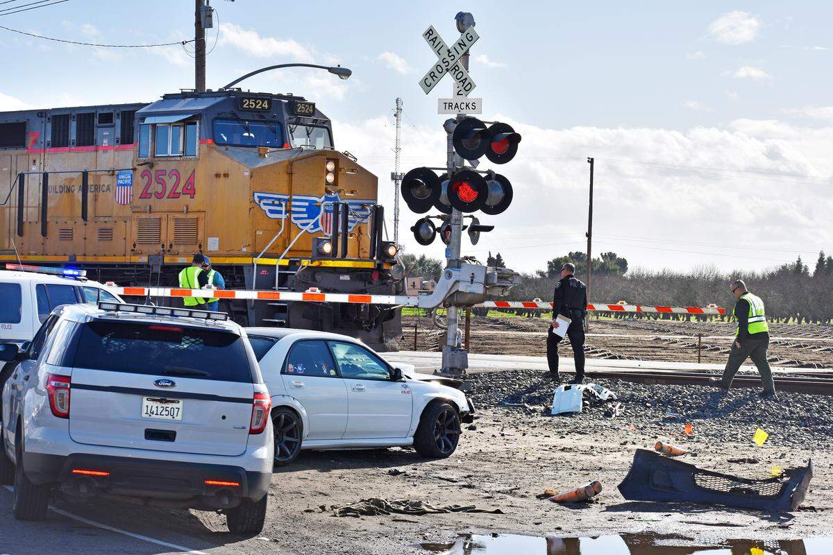 A train crashed into a car that got stuck on the railroad tracks near Salida Boulevard in Modesto, California on Thursday Jan. 25, 2018.