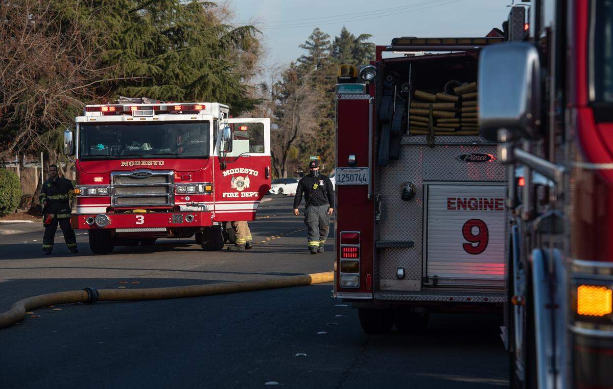 Turlock city staff on Tuesday, Dec. 14, 2021, are scheduled to ask the City Council for permission to request a fire contract proposal from Modesto. This file photo shows Modesto Fire Department responding to a structure fire on Dec. 30, 2020.