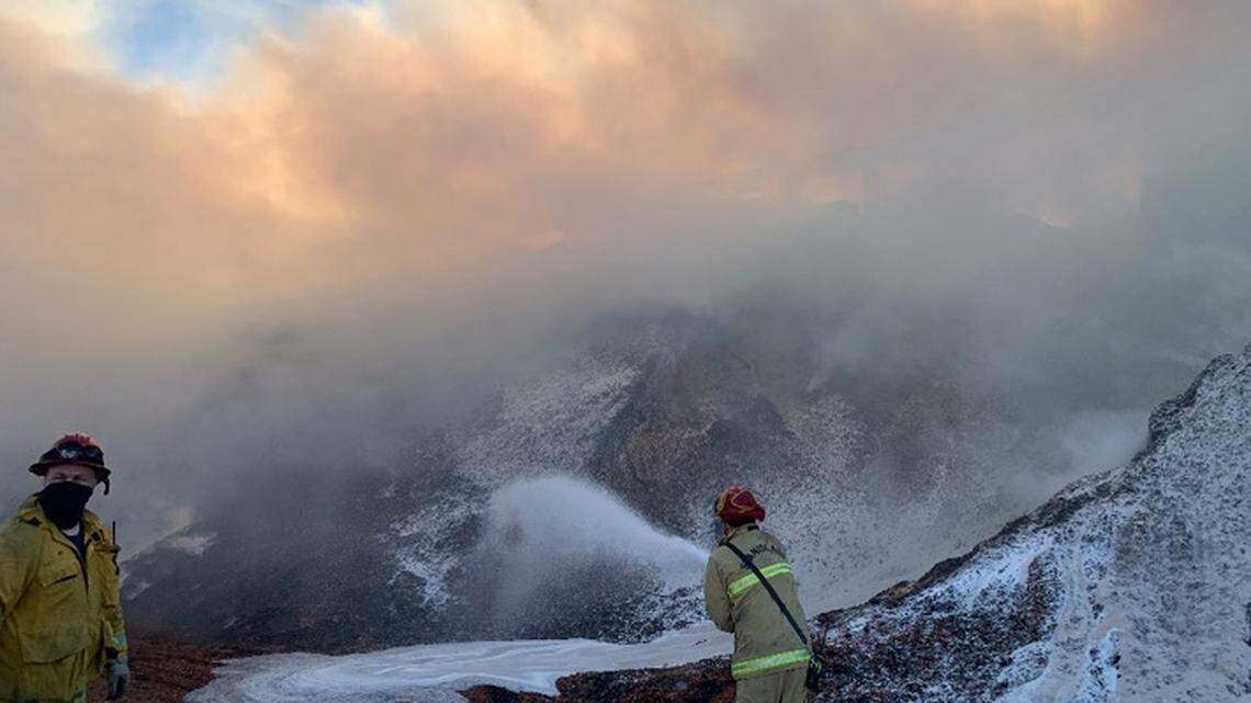 Firefighters battle an almond hull blaze Feb. 27 at a processing plant in Escalon.