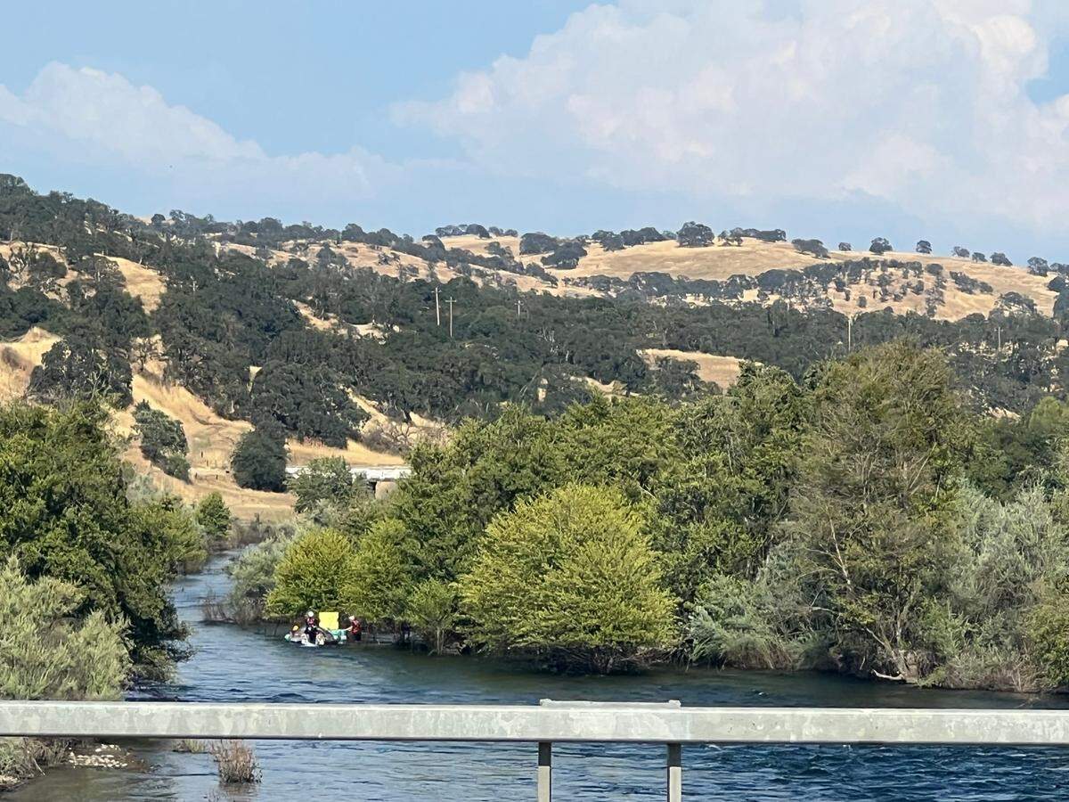 Modesto Firefighters rescue a woman from the Tuolumne River in La Grange on June 28, 2023