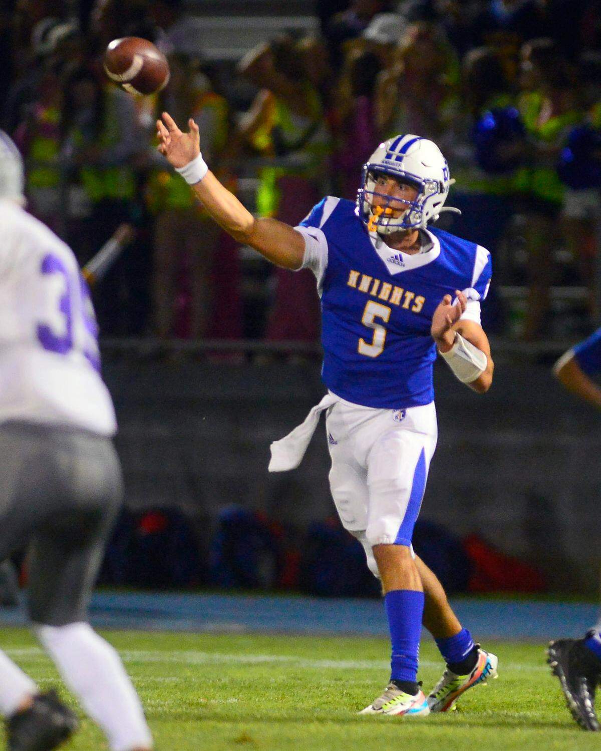 RC quarterback Trey Fasani throws a screen pass during a game between Ripon Christian and Denair at Ripon Christian High School in Ripon California on September 16, 2022.