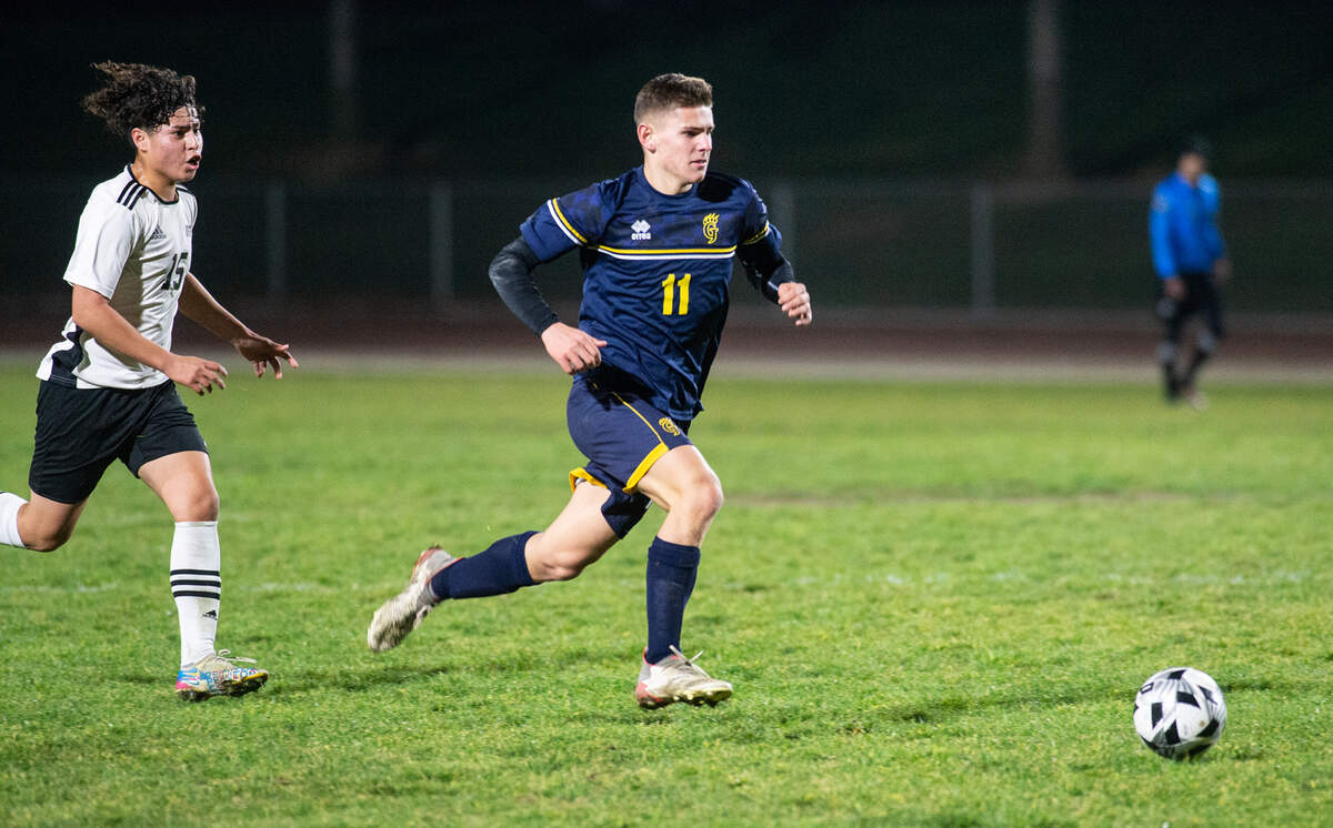Gregori’s Braden Herline advances the ball on a fast break during the Central California Athletic League game with Gregori at Gregori High School in Salida, Calif., on Tuesday, Jan. 11, 2022. Modesto won the game 4-1.