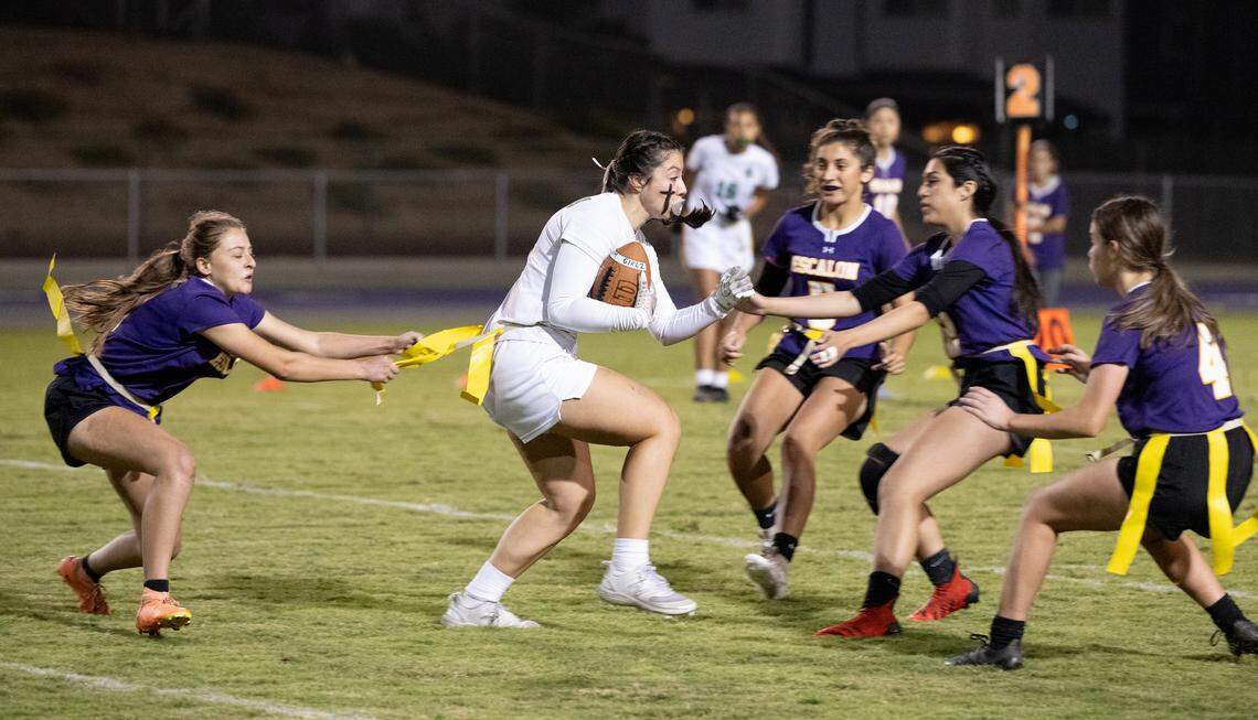 Escalon player swarm a St. Marys runner duirng the CIF Sac-Joaquin Section Division II semifinal playoff game in Escalon, Calif., Wednesday, Nov. 1, 2023.