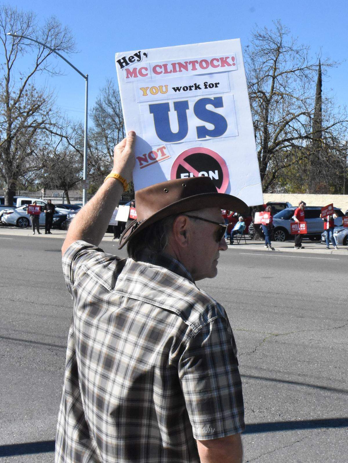 David Bean, a supporter of U.S. Postal Service workers, rallies along Mitchell Road opposite the Ceres post office on Sunday, March 23, 2025.