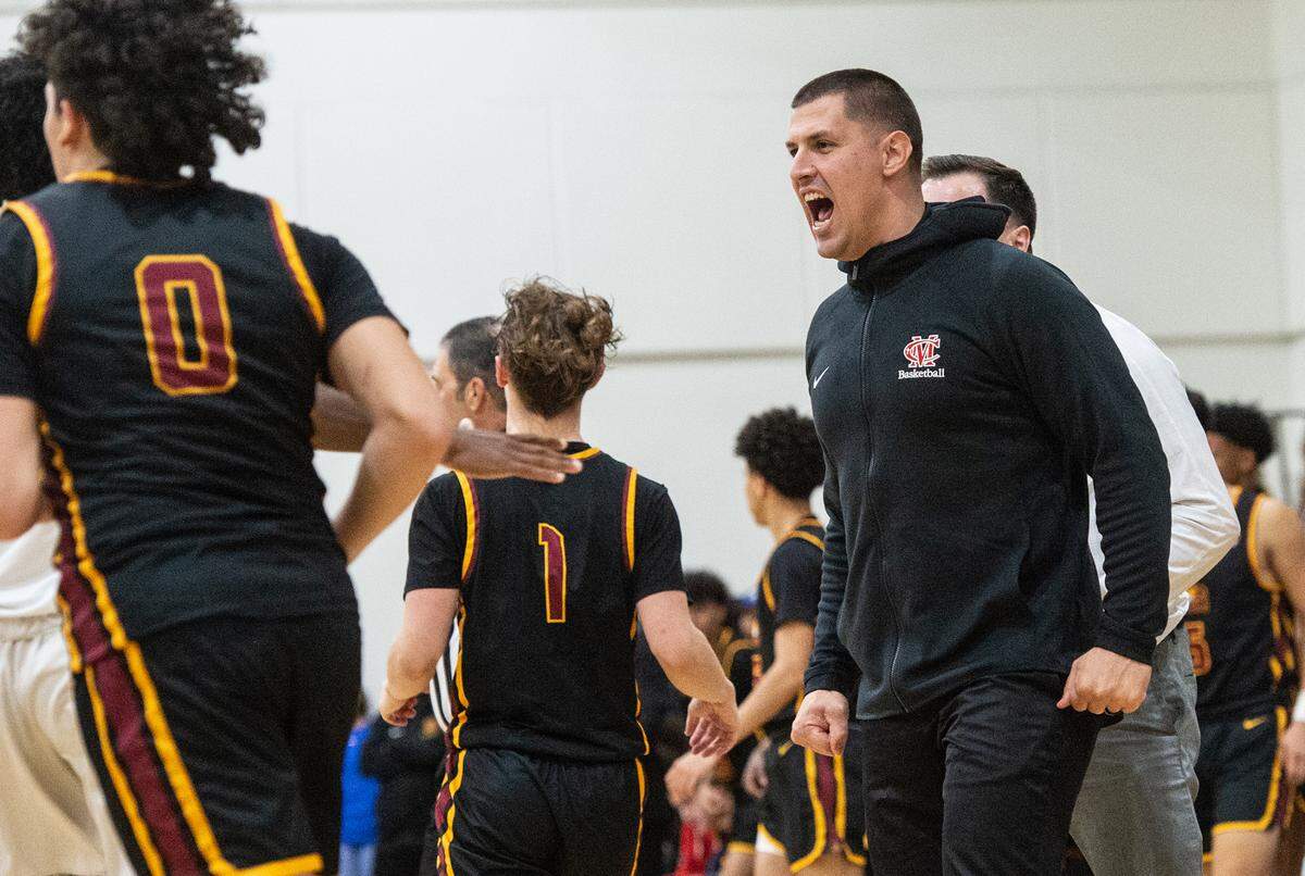 Modesto Christian’s coach Brice Fantazia reacts to a score during the Modesto Christian Holiday Hoop Classic championship game at Modesto Christian High School in Salida, Calif., Friday, Dec. 30, 2022. MC won the game 79-55.