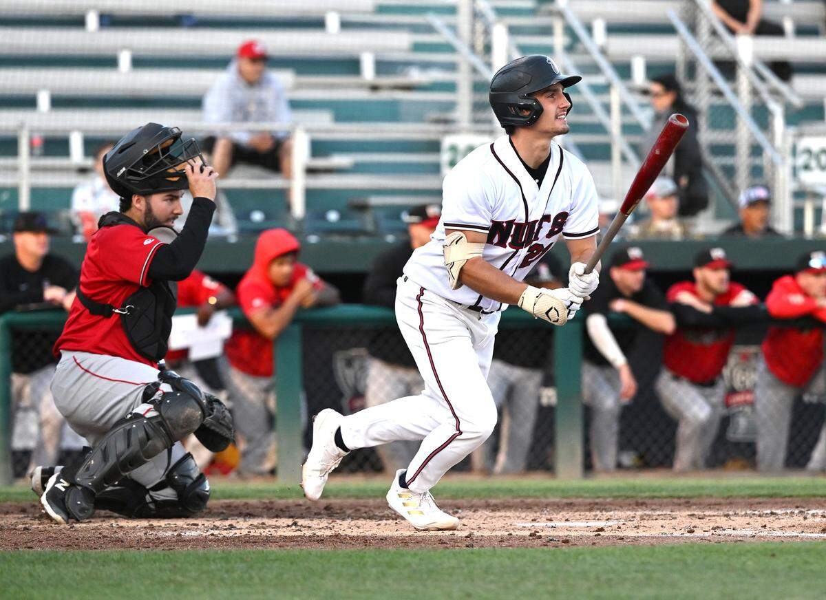 The Modesto Nuts Cole Young tracks a fly ball during a game with the Fresno Grizzlies at John Thurman Field in Modesto, Calif., Thursday, June 22, 2023. Fresno won the game 4-3.