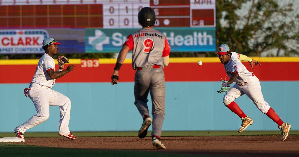 Modesto Roadsters second baseman Isaac Pena, right, flips the ball to shortstop Osiris Johnson to force out a RedPocket runner during the Pioneer League game at Modern Woodmen Field in Modesto on Tuesday, May 19, 2026.
