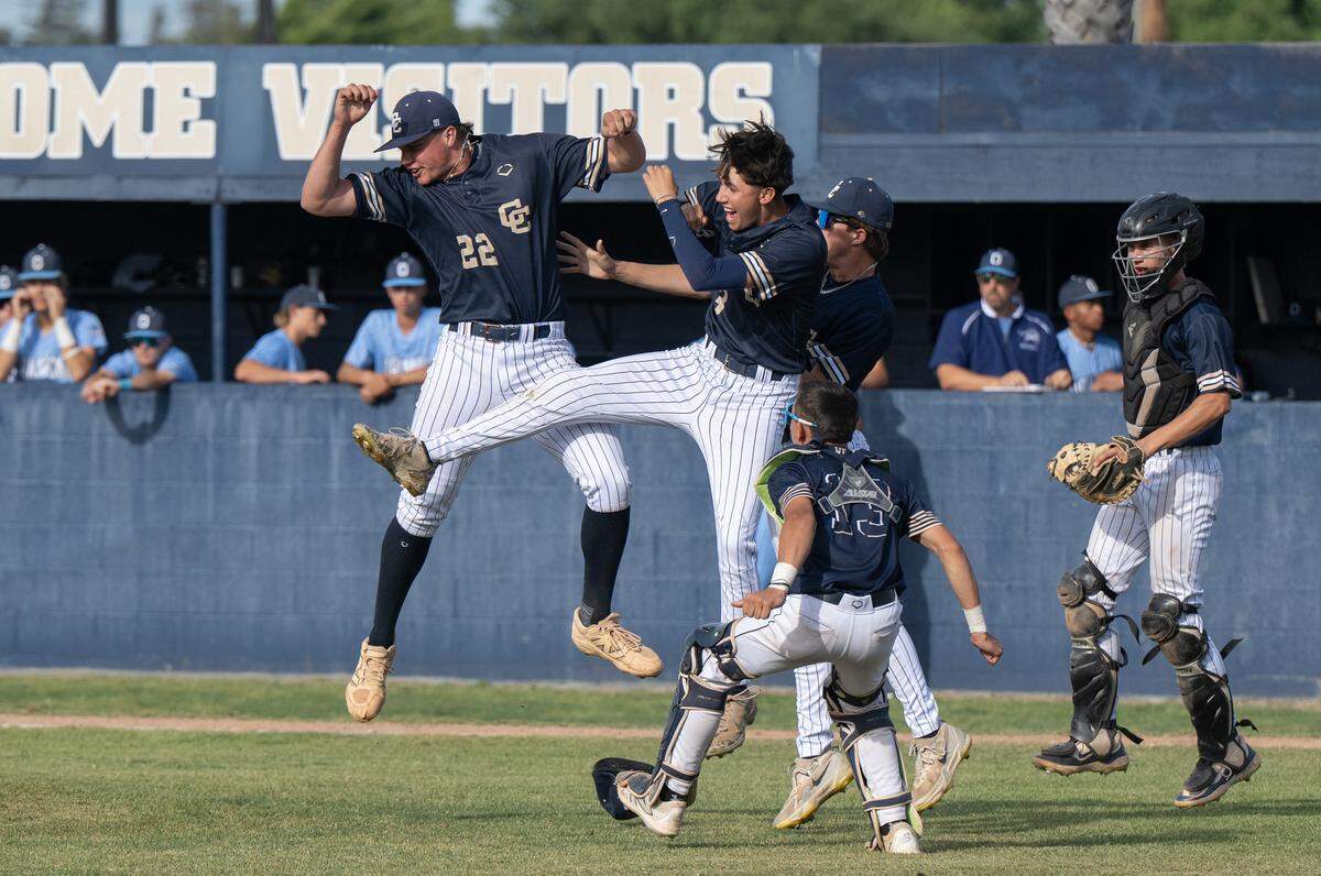 Central Catholic players celebrate their 3-1 win to close out the DIII Sac-Joaquin Section semifinal series with Oakmont at Central Catholic High School in Modesto, Wednesday, May 14, 2025. Central won the series 2-0 over the top-seeded Oakmont.