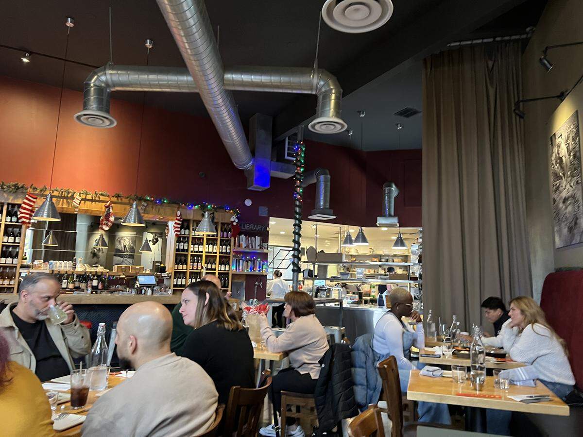 Diners at Camp 4 Wine Cafe in Modesto, California.