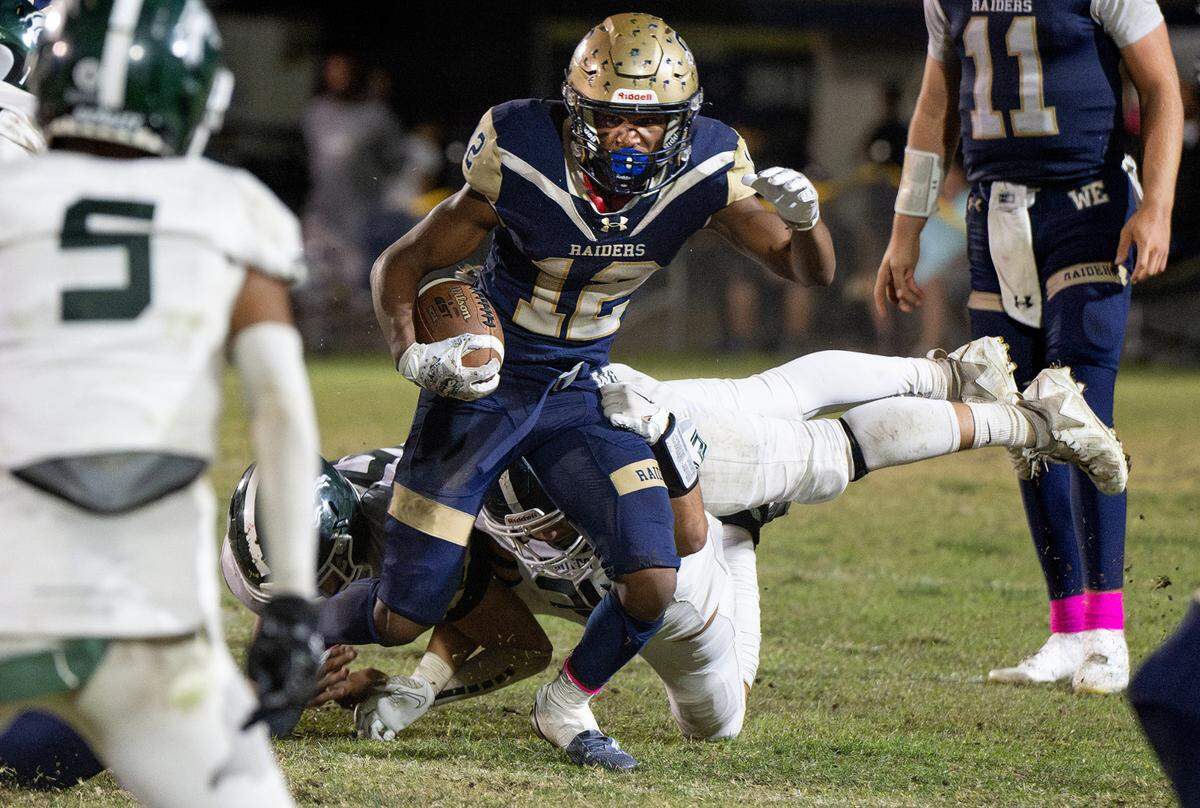 Central Catholic’s Joey Alcutt runs the ball during the Valley Oak League game with Manteca at Central Catholic High School in Modesto, Calif., Friday, Oct. 20, 2023. Central Catholic won the game 39-35.