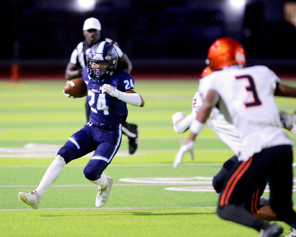 Downey running back Marcus Cruz (24) cuts back in attempt to juke a Merced defender during a game between Downey High School and Merced High School at Downey High School in Modesto California on September 1, 2023.